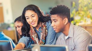 Tutor helping a student with work