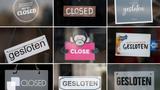 A compilation of signs on doors of temporarily closed restaurants and shops in central Maastricht, Netherlands, March 16, 2020, photo by Francois Lenoir/Reuters