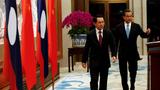 Laos Foreign Minister Saleumxay Kommasith (L) and Chinese counterpart Wang Yi following a meeting in Beijing, China, August 3, 2016, photo by Rolex Dela Pena/Pool/Reuters