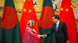 Bangladesh's Prime Minister Sheikh Hasina and China's Premier Li Keqiang shake hands during a signing ceremony at the Great Hall of the People in Beijing, China July 4, 2019, photo by Mark Schiefelbein/Pool via Reuters