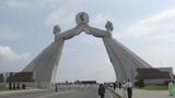 People take part in the celebrations for the National Liberation Day near the Arch of Reunification in the city of Pyongyang, North Korea, August 14, 2005, photo by Yuri Maltsev/Reuters