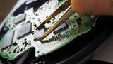 Chips being installed on a microprocessor, photo by Hseyin/Adobe Stock