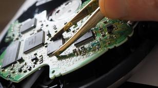 Chips being installed on a microprocessor, photo by Hseyin/Adobe Stock