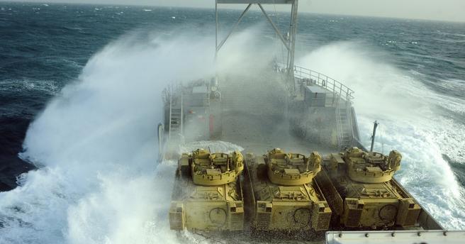 Waves crash over the side of U.S. Army Vessel Churubusco in the Persian Gulf Jan. 9 during a training mission named "Operation Spartan Mariner."