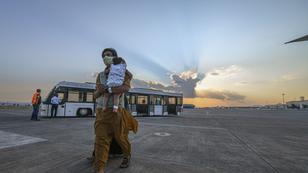 Evacuees from Afghanistan board a Boeing 777 bound for the United States from Naval Air Station Sigonella in Sicily, Italy, August 28, 2021, photo by EyePress News/Reuters