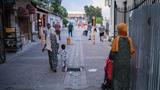 Syrian refugee women take their children for a walk in Izmir, Turkey, June 19, 2023, photo by Murat Kocabas/SOPA Images via Reuters