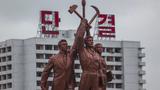 A typical communist style statue in the capital city of North Korea, photo by alexkuehni/Getty Images