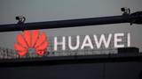 Surveillance cameras are seen in front of a Huawei logo in Belgrade, Serbia, August 11, 2020, photo by Marko Djurica/Reuters