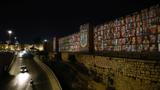 The faces of hostages kidnapped by Hamas are projected on the outer wall of the Old City of Jerusalem, in Jerusalem, Israel, November 6, 2023, photo by James Oatway/Reuters