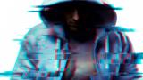 Computer hacker with hoodie and obscured face, photo by Dony/Getty Images
