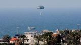 Aid is air-dropped in Rafah in the southern Gaza Strip, February 26, 2024, photo by Ibraheem Abu Mustafa/Reuters