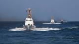 U.S. Coast Guard boats patrol open seas in the Fifth Fleet area of operations, February 1, 2018, photo by Mass Communication Specialist 2nd Class Kevin J. Steinberg/U.S. Navy
