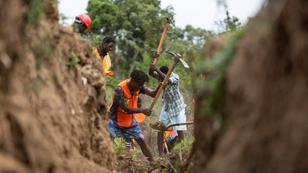 Residents of the Malfety neighborhood work on the construction of an irrigation canal in Fort Libert&eacute;, Haiti, April 27, 2024, photo by Ricardo Arduengo/Reuters