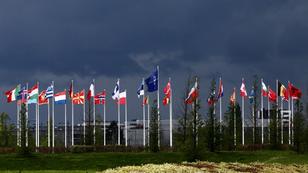 National flags of the Alliance's members flutter at the NATO headquarters in Brussels, Belgium, April 17, 2024, photo by Yves Herman/Reuters