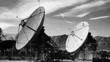 two large ground satellites at a military base