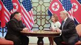 North Korea's leader Kim Jong-un and then-U.S. President Donald Trump talk during the second North Korea-U.S. summit in Hanoi, Vietnam, March 1, 2019, photo by KCNA via Reuters