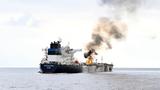 Oil tanker <em>Marlin Luanda</em> on fire after a missile attack by Houthi fighters, 60 nautical miles southeast of Aden, Yemen, January 26, 2024, Indian Navy handout via EyePress News/Reuters