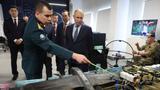 Russian President Vladimir Putin inspects models of weapons and military equipment produced for Russian armed forces in Yakutsk, Russia, June 18, 2024, photo by Sputnik/Petr Kovalev/Pool via Reuters