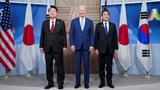 South Korea's President Yoon Suk Yeol, U.S. President Joe Biden, and Japanese Prime Minister Fumio Kishida stand together for a trilateral meeting at the APEC summit in San Francisco, California, November 16, 2023, photo by Kevin Lamarque/Reuters 
