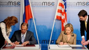 Then-U.S. Secretary of State Hillary Clinton and Russian Foreign Minister Sergei Lavrov signing documents on the new launch agreement at the 47th Security Conference in Munich, Germany, February 5, 2011, photo by Tobias Hase/DPA Pictures Alliance via Reuters