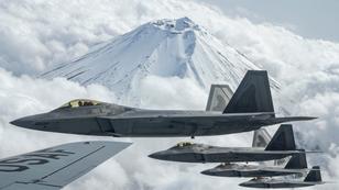 U.S. Air Force Raptors fly alongside a USAF Stratotanker during fighter training near Mt. Fuji, Japan, April 1, 2021, photo by SrA Rebeckah Medeiros/U.S. Air Force