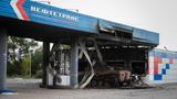 A burnt-out Russian military vehicle at a local petrol station in Sudzha, Kursk Oblast, Russia, August 16, 2024, photo by Ukrinform/Sipa USA via Reuters