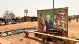 Russian President Vladimir Putin and Burkina Faso's interim military president Ibrahim Traor&eacute; are pictured on a poster with the slogan &ldquo;Support for the transition&rdquo; in Ouagadougou, Burkina Faso, March 5, 2024, photo by Christina Peters/Reuters