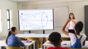 Young female teacher teaches in a high school classroom, photo by Wavebreak Media/Adobe Stock