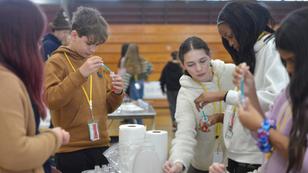 Sixth graders fill test tubes with fresh and salt water to demonstrate differences in densities at a project-based learning event called WET Fest at Barnstable Intermediate School, in Barnstable, Massachusetts, February 26, 2024, photo by Merrily Cassidy/USA Today via Reuters