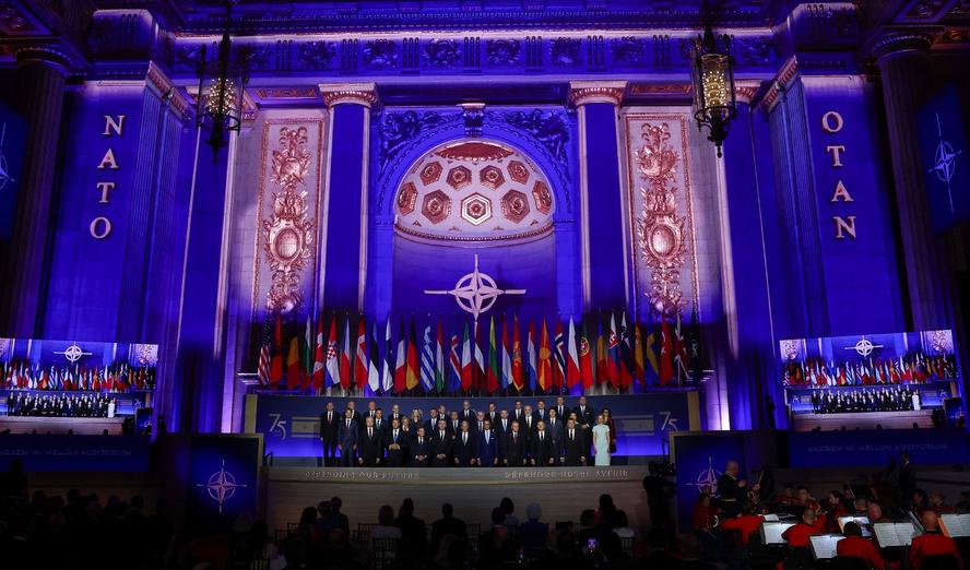 Heads of state  and other officials pose for a family photo at the 2024 NATO summit in Washington, D.C., July 9, 2024, photo by Yves Herman/Reuters