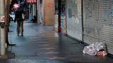 A person experiencing homelessness sleeps unsheltered on the Walk of Fame in Hollywood, California, February 6, 2020, photo by Mike Blake/Reuters
