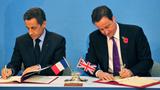 French President Nicolas Sarkozy and British Prime Minister David Cameron sign treaties during a UK-France summit at Lancaster House in London, United Kingdom,  November 2, 2010, <a href=file_cameron_and_sarkozy.html>photo</a> by  UK Prime Minister's Office/<a href="https://www.nationalarchives.gov.uk/doc/open-government-licence/version/1/open-government-licence.htm">OGL v1.0</a>