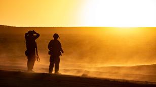 Soldiers from the 10th Special Forces Group Airborne look out over the National Training Center at Fort Irwin, California, August 17, 2021, photo by Spc. Steven Alger/U.S. Army