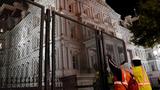 Workers install security fencing outside the Executive Office Building near the White House, before the U.S. presidential election, Washington, D.C., November 2, 2024, photo by Erin Scott/Reuters