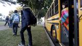Students exit a bus as they arrive at Venice High School in Los Angeles, California, December 16, 2015, photo by Jonathan Alcorn/Reuters