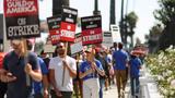 SAG-AFTRA actors and Writers Guild of America writers walk the picket line during their strike outside Netflix offices in Los Angeles, California, September 22, 2023, photo by Mario Anzuoni/Reuters