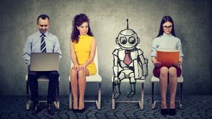Cartoon robot in line with applicants for a job, photo by SIphotography/Getty Images