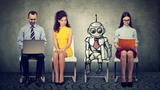 Cartoon robot in line with applicants for a job, photo by SIphotography/Getty Images