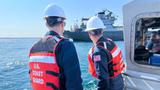 the U.S. Coast Guard, along with state and local agencies, respond to the <em>Manitowoc</em> diesel fuel spill in Lake Michigan, August 2, 2023, photo by Seaman Christine Bills/U.S. Coast Guard
