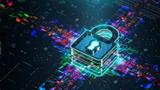 Cybersecurity concept with digital representation of a circuit board and a lock, photo by da-kuk/Getty Images