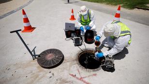 Employees of a wastewater management technology firm demonstrate a sewer surveillance project aimed at tracking COVID-19 outbreaks by identifying traces of the virus in the sewage system, Ashkelon, southern Israel, July 30, 2020, photo by Amir Cohen/Reuters