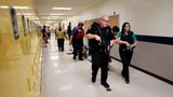 The Cherokee County Sheriff's Office conducts an active shooter drill at Mill Creek Middle School in Woodstock, Georgia, on June 8, 2022, photo by Jason Getz/TNS/Abaca Press via Reuters