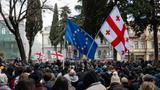 Demonstrators gather as Georgia's outgoing pro-EU President Salome Zourabishvili addresses the audience during a meeting ahead of Georgian President-elect Mikheil Kavelashvili's inauguration in Tbilisi, Georgia, December 29, 2024, photo by Jerome Gilles/Reuters