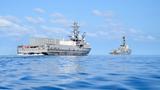 The unmanned surface vessel Ranger trails the Arleigh Burke-class guided-missile destroyer USS Shoup (DDG 86) during a Pacific Fleet exercise on September 15, 2023, photo by MC2 Jesse Monford/U.S. Navy