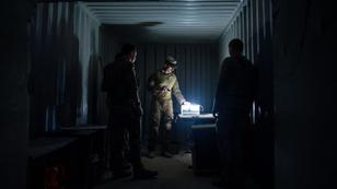 Explosive ordnance disposal technicians debrief during an irregular warfare exercise at an undisclosed locaaion  September 4, 2024, photo by Senior Airman Zachary Foster/U.S. Air Force