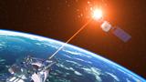 A laser cannon incapacitates an enemy satellite, illustration by 3DSculptor/Getty Images