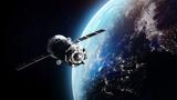 Cargo spaceship on orbit of the Earth planet, photo by dimazel/Getty Images