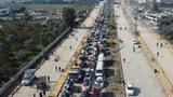 Displaced Palestinians waiting to have their vehicles inspected by the Egyptian-Qatari committee as they return to their homes in northern Gaza from the south, in the central Gaza Strip, January 28, 2025, photo by Mohammed Salem/Reuters
