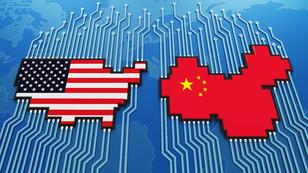 Chinese and U.S. flags as microchips on a digital board, illustration by kritsapong jieantaratip/Getty Images