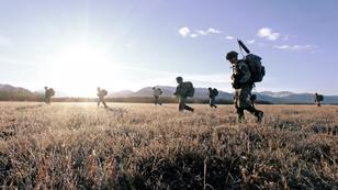 U.S. Army Soldiers assigned to 2nd Infantry Brigade Combat Team (Airborne), 11th Airborne Division, move towards their objective on Malamute Drop Zone in Joint Base Elmendorf-Richardson, Alaska for Arctic Aloha Oct. 15, 2024. Whether working in Alaska, the Indo-Pacific or around the globe, the division constantly trains alongside partners from the joint force, increasing interoperability and improving the ability to project combat credible forces across the Indo-Pacific. U.S. Army photo by Spc. Brandon Vasquez.